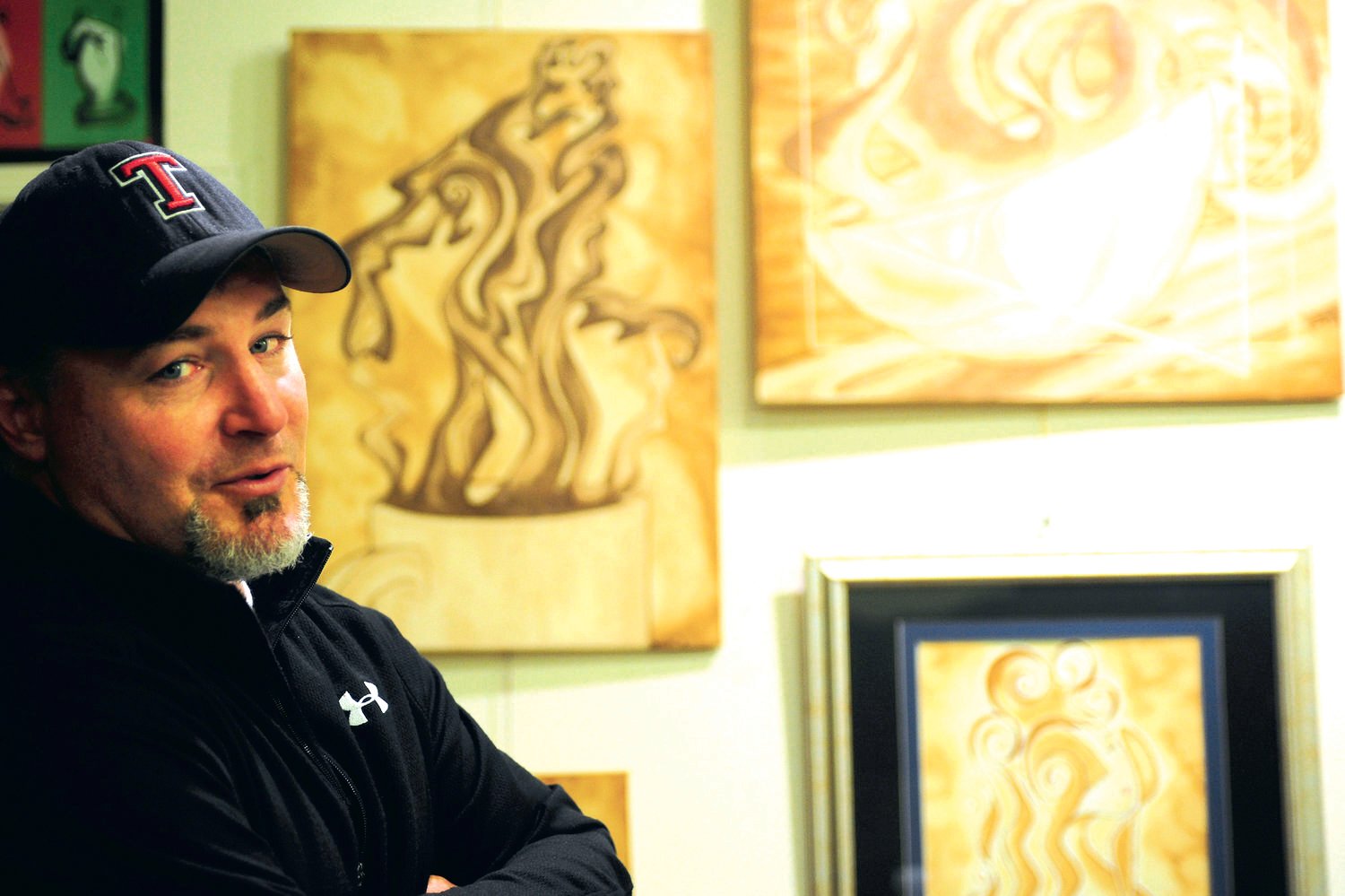 Ron Gaul explains how he came up with coffee art as a painting medium in this 2012 Chronicle file photo.